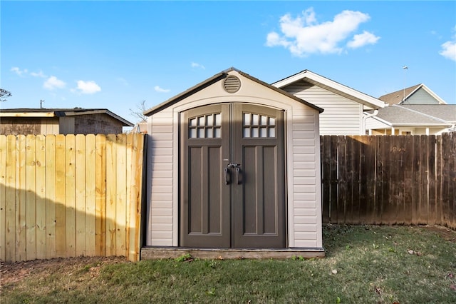 view of outdoor structure with a yard