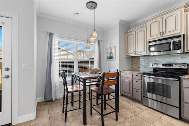 kitchen with hanging light fixtures, stainless steel appliances, light stone counters, backsplash, and ornamental molding