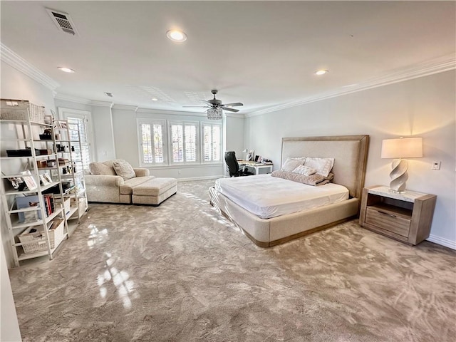 bedroom featuring ceiling fan, carpet floors, and crown molding