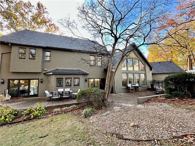 rear view of property with a patio area