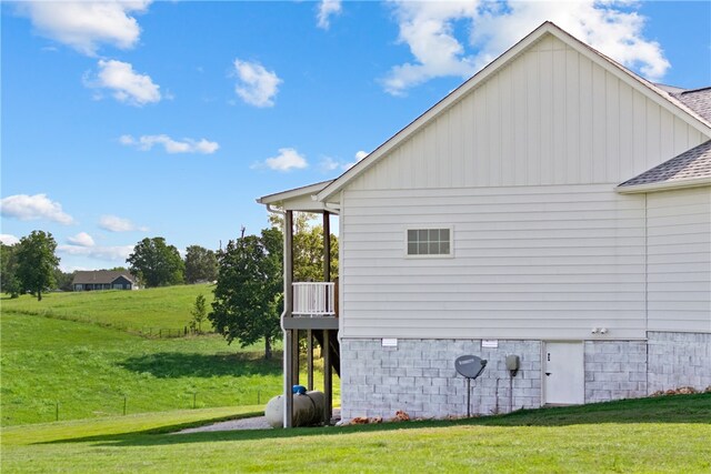 view of home's exterior featuring a yard