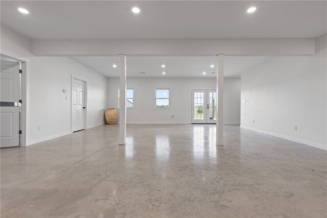 empty room featuring french doors