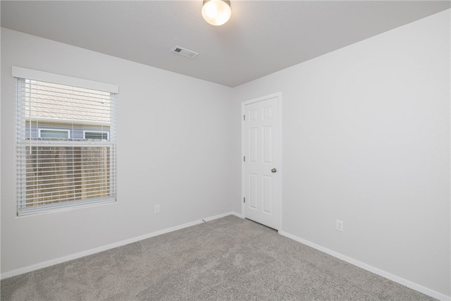 empty room with carpet floors