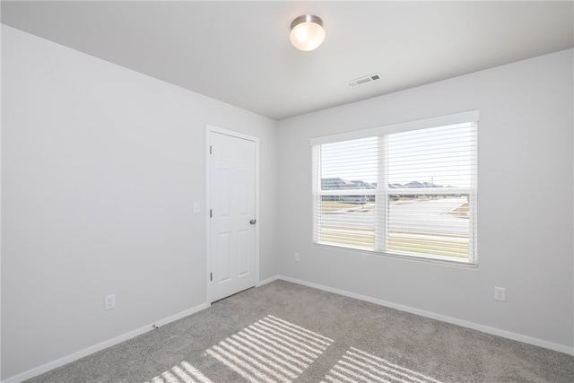 view of carpeted spare room