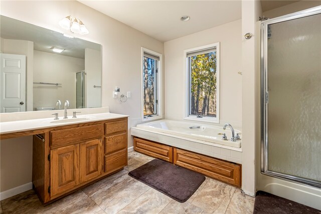 bathroom featuring plus walk in shower and vanity