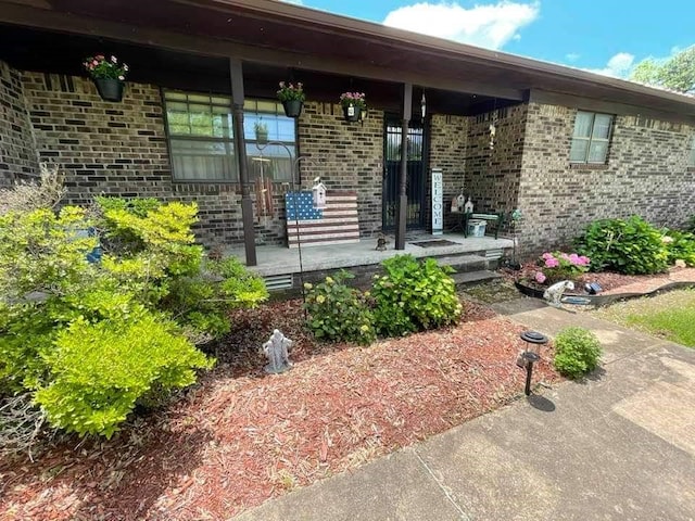 entrance to property with covered porch