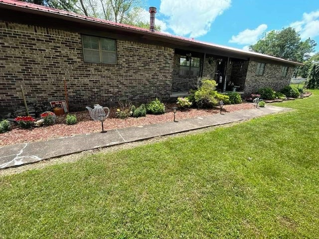 ranch-style house with a front lawn