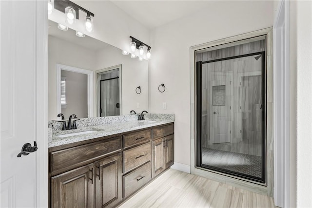 bathroom with vanity and walk in shower