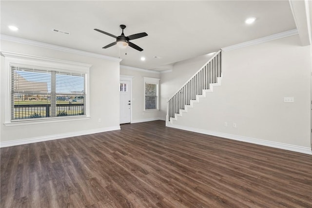 unfurnished living room with dark wood-type flooring, ornamental molding, and ceiling fan