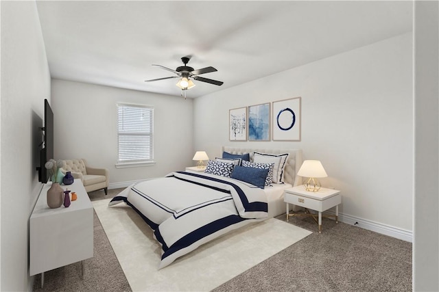 bedroom with ceiling fan and carpet