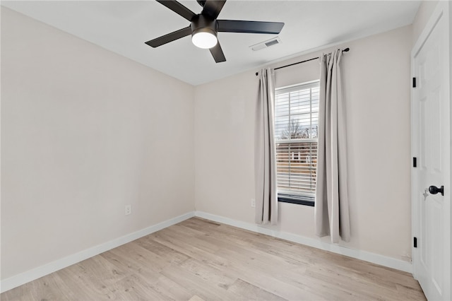 unfurnished room with ceiling fan and light hardwood / wood-style floors