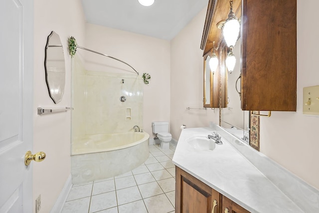 full bathroom with tile patterned flooring, vanity, toilet, and tiled shower / bath