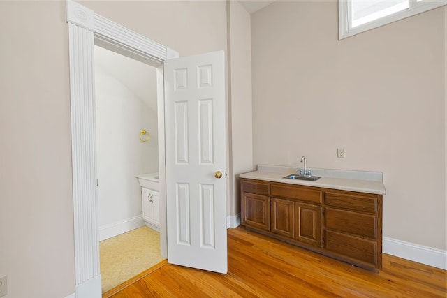 bathroom featuring hardwood / wood-style floors and sink