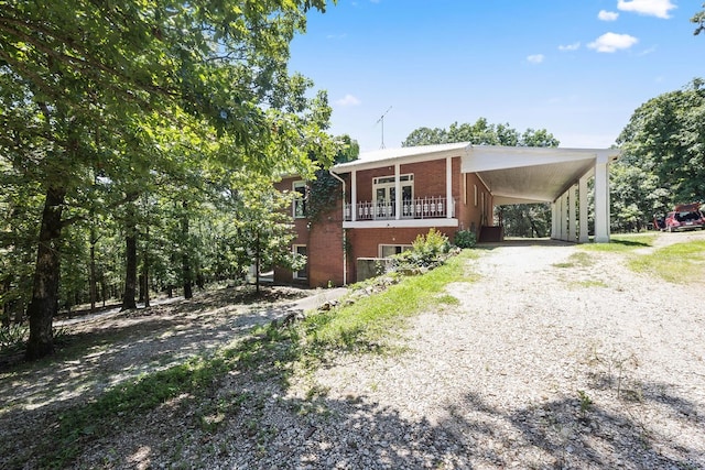 view of front of home featuring a carport