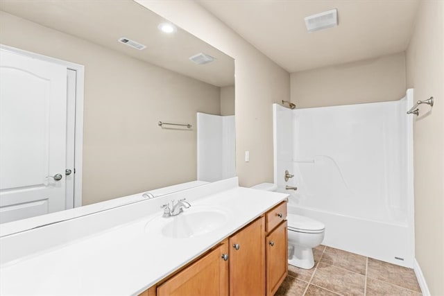 full bathroom featuring bathtub / shower combination, vanity, toilet, and tile patterned flooring