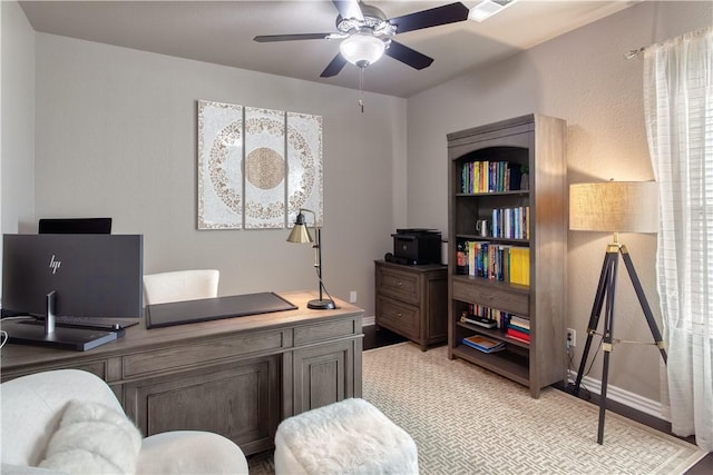 home office with a ceiling fan