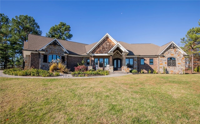 craftsman-style house with a front lawn