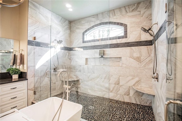 bathroom with shower with separate bathtub