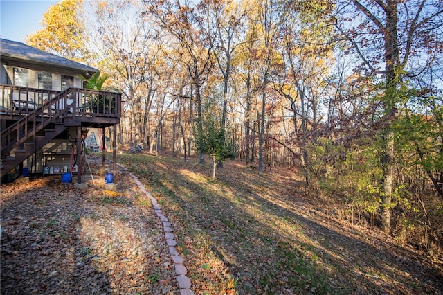 view of yard featuring a wooden deck