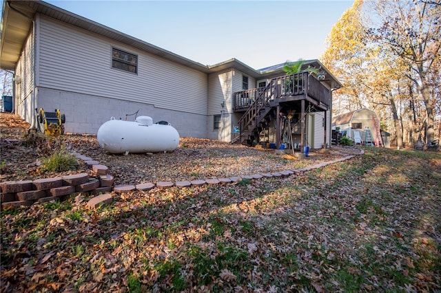 back of property with a deck