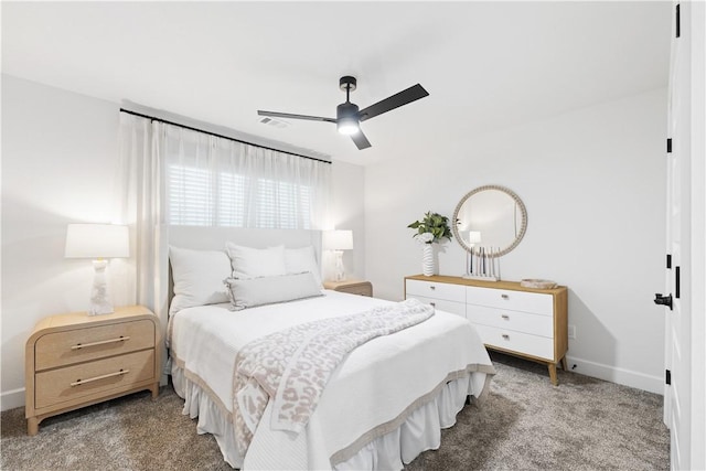 6309 NW Harley St, Bentonville, AR 72713 - carpeted bedroom with baseboards and a ceiling fan