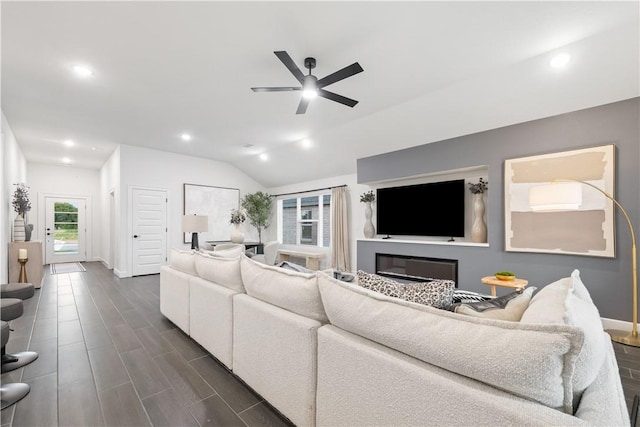 6309 NW Harley St, Bentonville, AR 72713 - living room featuring ceiling fan, lofted ceiling, recessed lighting, and dark wood finished floors