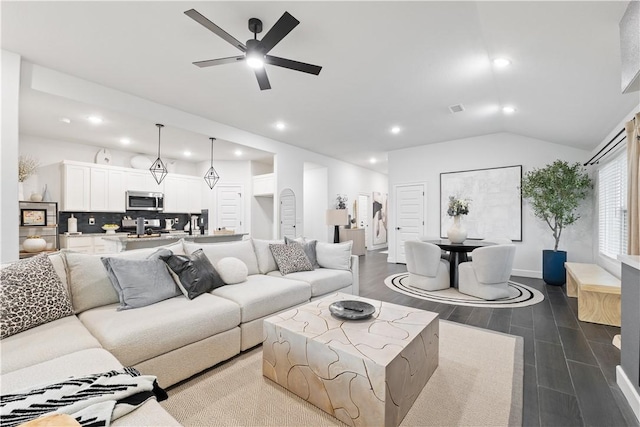 6309 NW Harley St, Bentonville, AR 72713 - living area with a ceiling fan, recessed lighting, dark wood-type flooring, and lofted ceiling