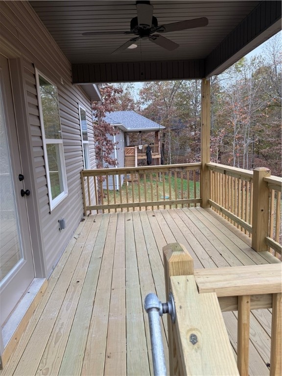 wooden terrace with ceiling fan