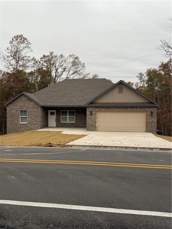 ranch-style home with a garage