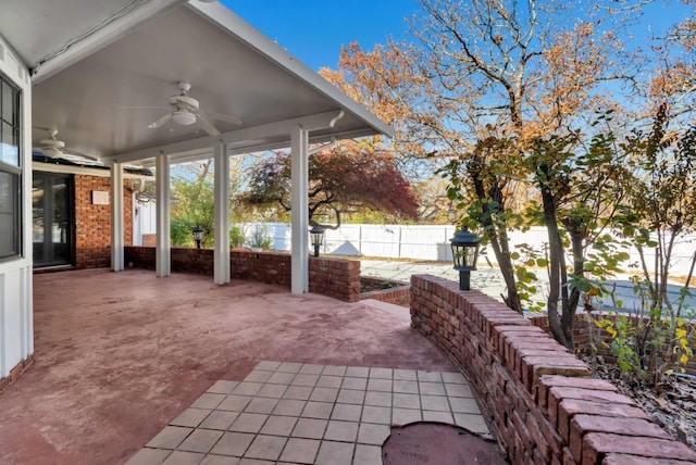 view of patio featuring ceiling fan