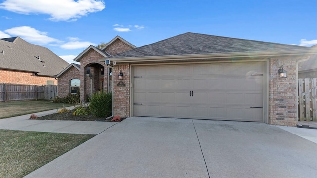 ranch-style house featuring a garage