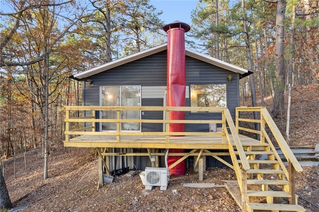 10305 Jims Trl, Rogers, AR 72756 - rear view of house featuring ac unit, a deck, and stairs