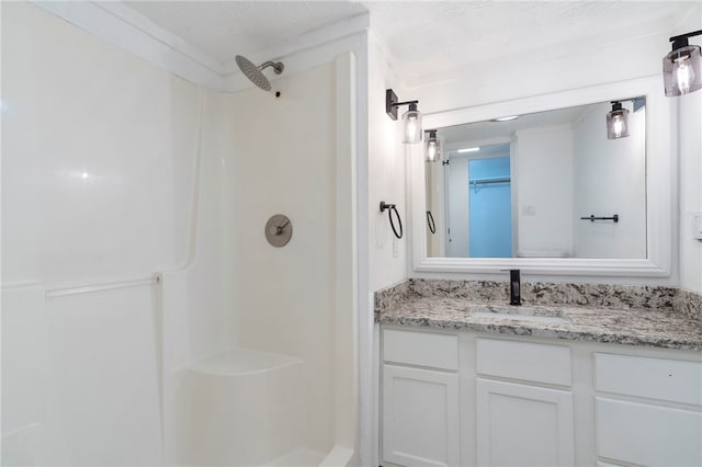 10305 Jims Trl, Rogers, AR 72756 - bathroom featuring a shower and vanity