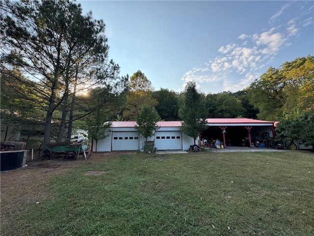 view of yard featuring a garage