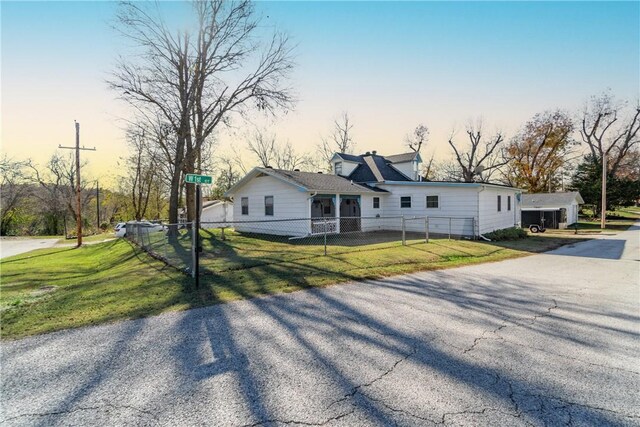 view of front of property with a lawn