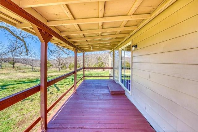 deck featuring a yard