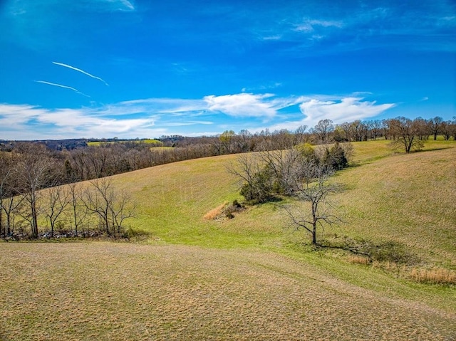 exterior space with a rural view