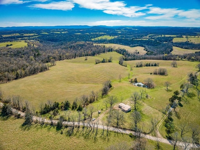 birds eye view of property featuring a rural view