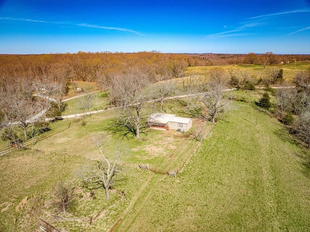 birds eye view of property with a rural view