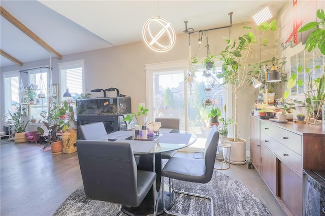 dining space with light wood finished floors