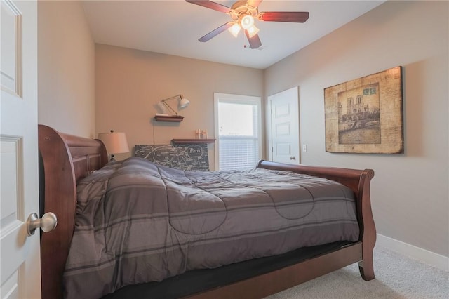 bedroom featuring baseboards, carpet floors, and ceiling fan