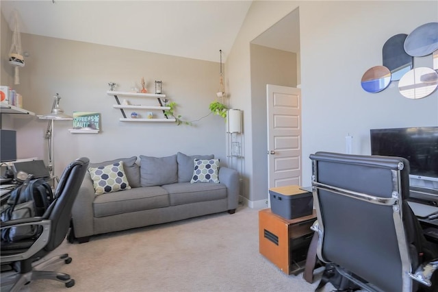 office with carpet floors and lofted ceiling