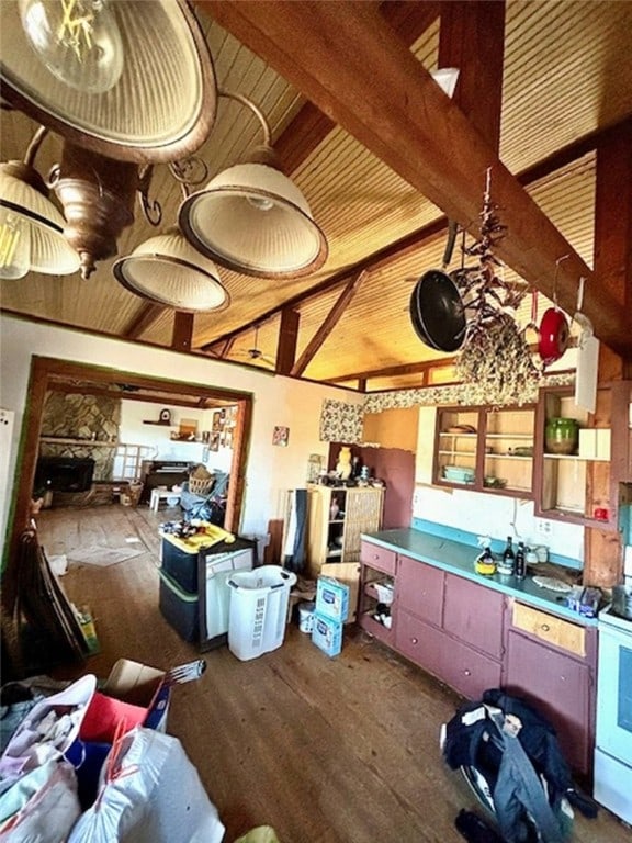 interior space with white range oven, beamed ceiling, dark hardwood / wood-style floors, and high vaulted ceiling