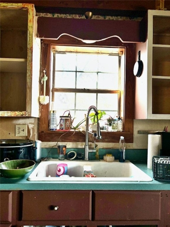 kitchen with a healthy amount of sunlight and sink