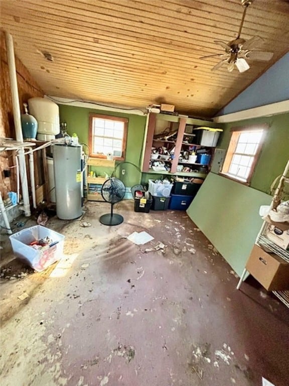 miscellaneous room featuring water heater, a healthy amount of sunlight, lofted ceiling, and wooden ceiling