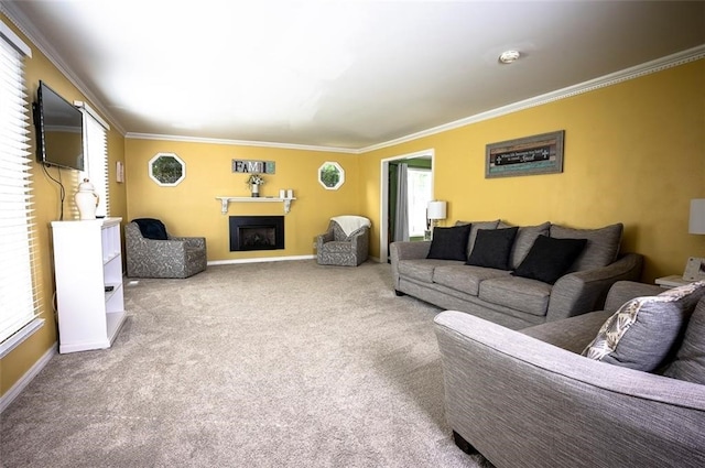 carpeted living room with plenty of natural light and crown molding