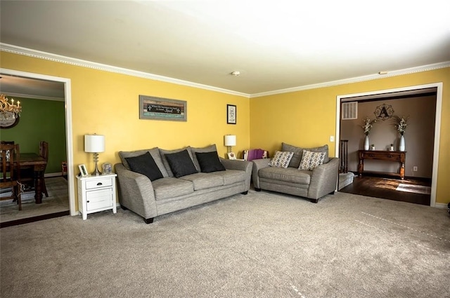 living room with carpet floors, an inviting chandelier, and crown molding