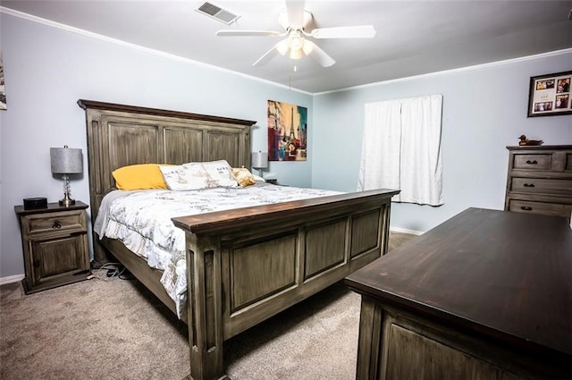 bedroom with ceiling fan, light colored carpet, and ornamental molding