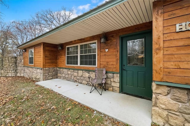 15258 Shipe Rd, Gravette, AR 72736 - entrance to property featuring stone siding