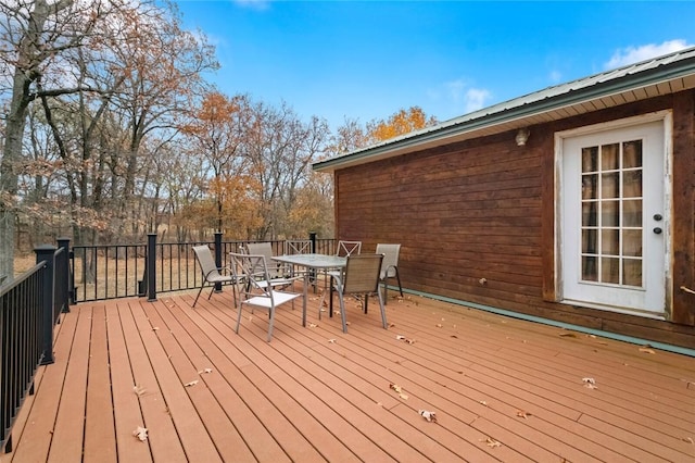 15258 Shipe Rd, Gravette, AR 72736 - wooden deck featuring outdoor dining area